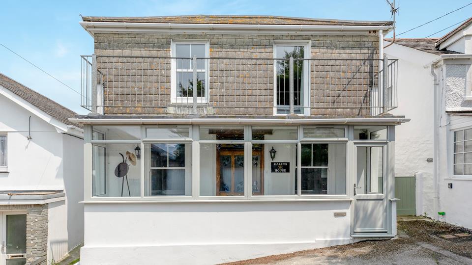 Ealing House exterior showing balcony and traditional Cornish architecture in Porthleven